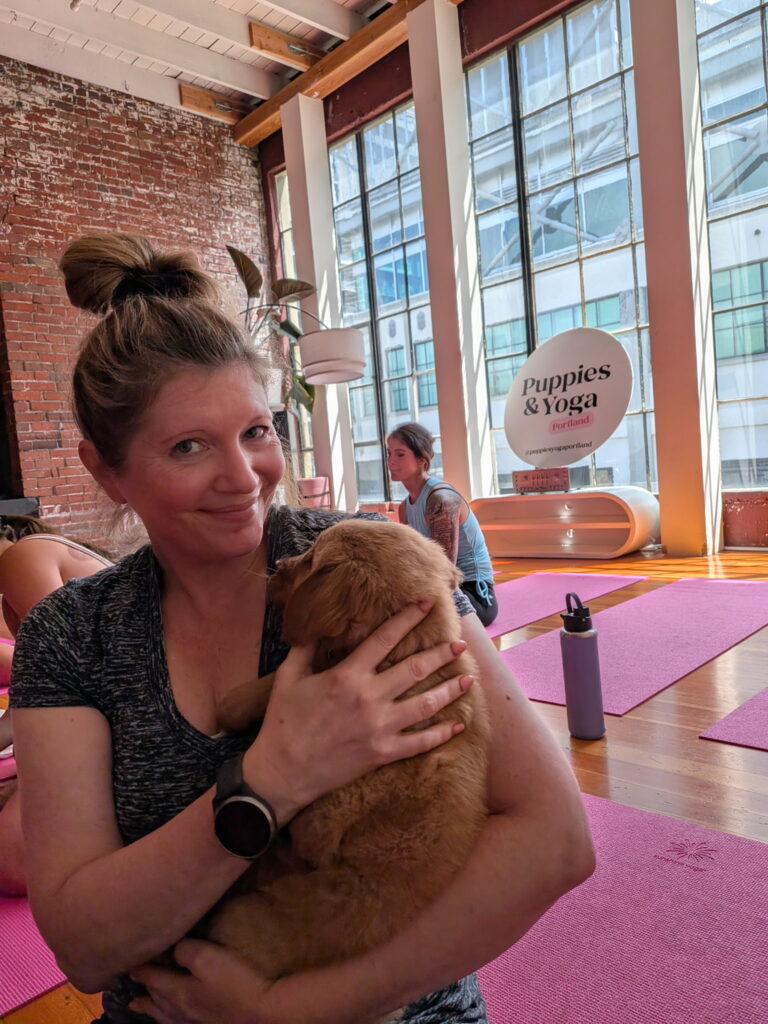 Jea doing Puppies & Yoga.